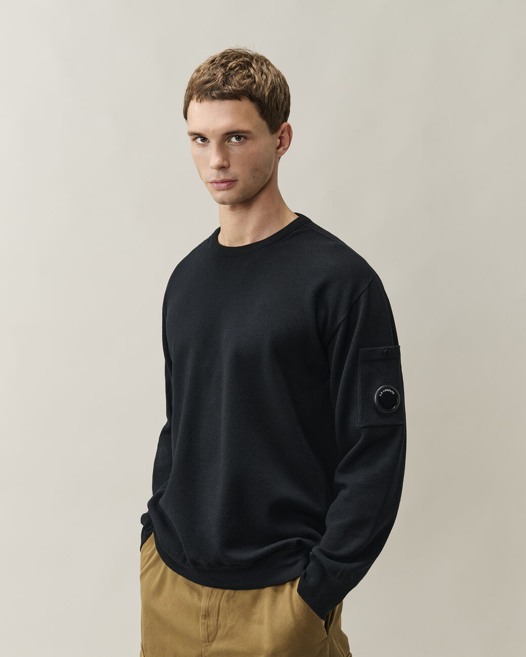 21CMKN074A005528A KNITWEAR-CREW NECK C.P. COMPANY FW26 - BLACK