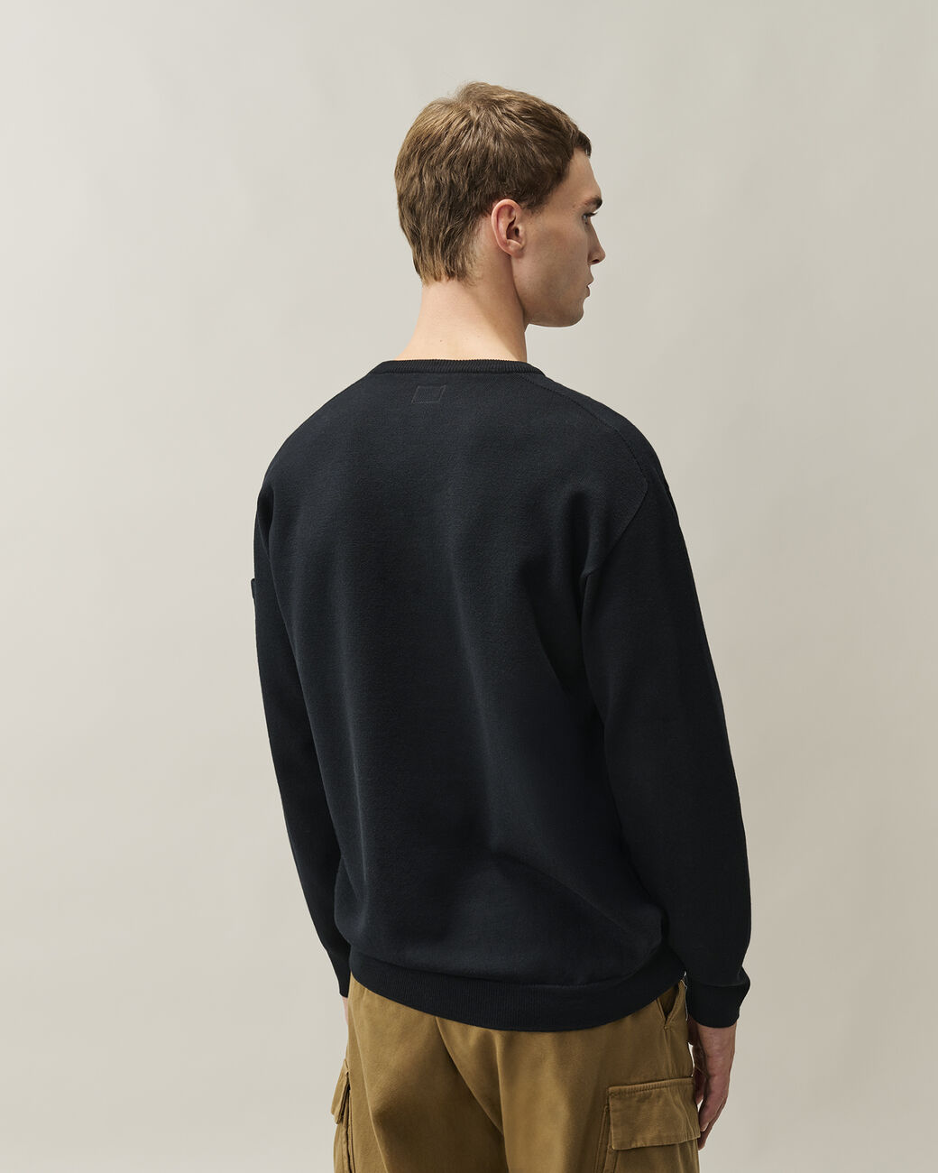21CMKN074A005528A KNITWEAR-CREW NECK C.P. COMPANY FW26 - BLACK