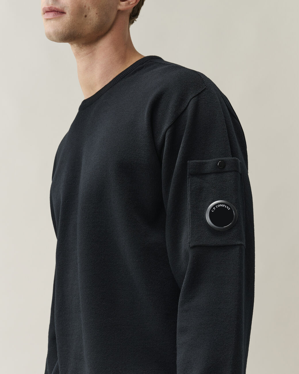 21CMKN074A005528A KNITWEAR-CREW NECK C.P. COMPANY FW26 - BLACK